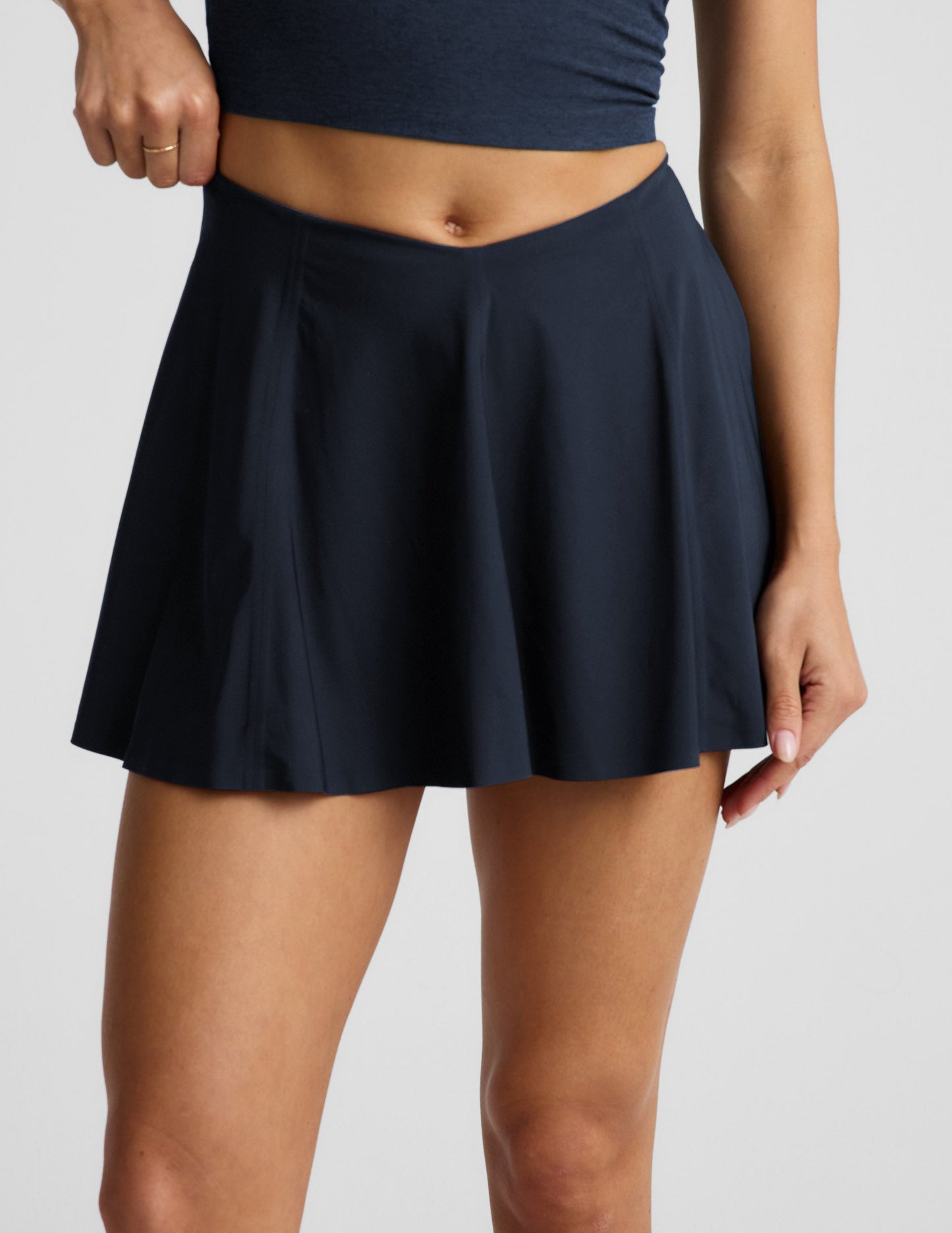 Beyond Yoga Women's Mid Rise Tennis Mini Skirt - Navy