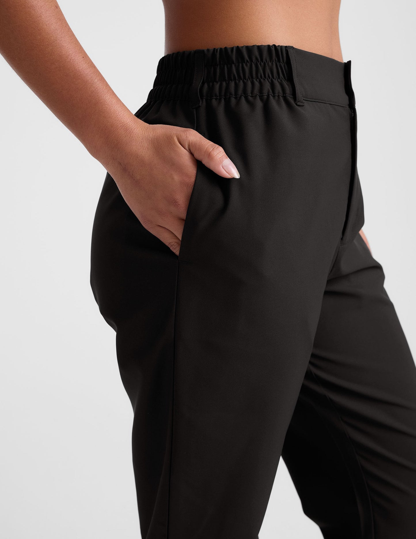 Beyond Yoga Women's Tapered Mid Rise Jetstretch Pants - Black